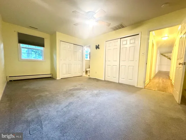 a bathroom with a sink a mirror and a shower