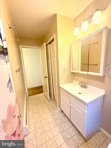 a view of a hallway view with staircase