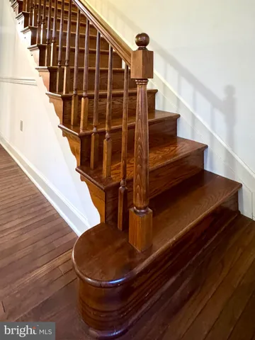 a view of a chairs on wooden deck