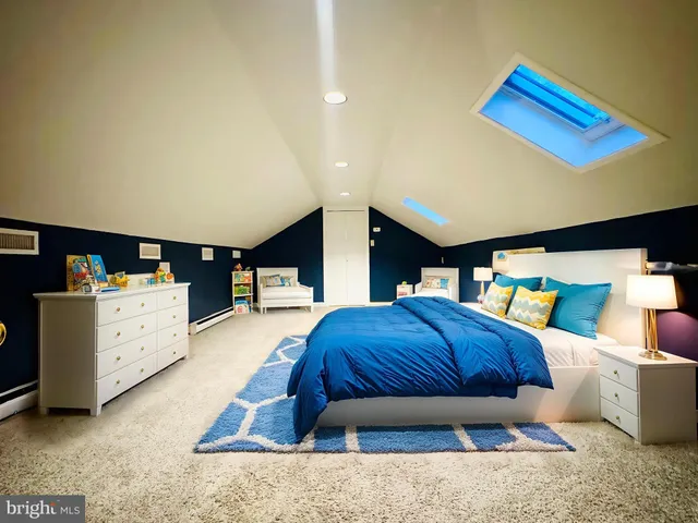 a view of a backyard with large trees