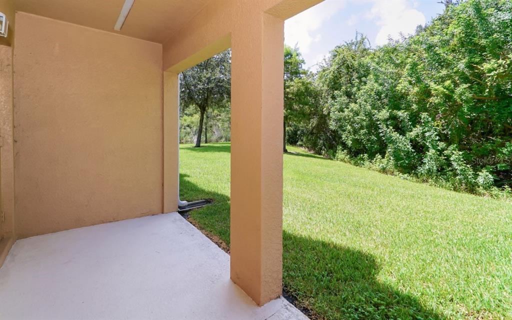 7339 Black Walnut Way Lakewood Ranch, FL 34202 - Photo 21 of 27 a view of a yard with an outdoor space