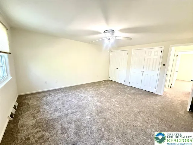 an empty room with a projector