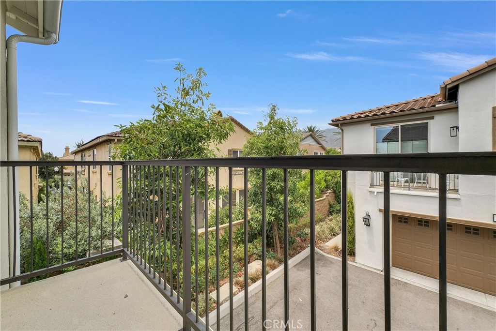 5584 Kate Way, Unit 10 Fontana, CA 92336 - Photo 26 of 42 a view of a small yard from a balcony