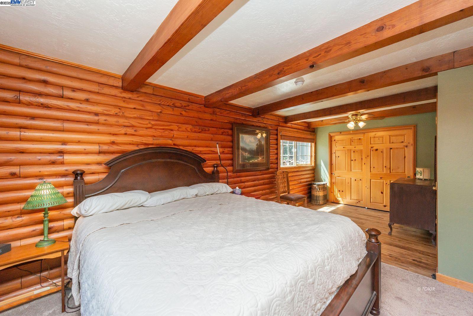 21 Cedar Road Trinity Center, CA 96091 - Photo 11 of 50 a bedroom with a bed and a large window
