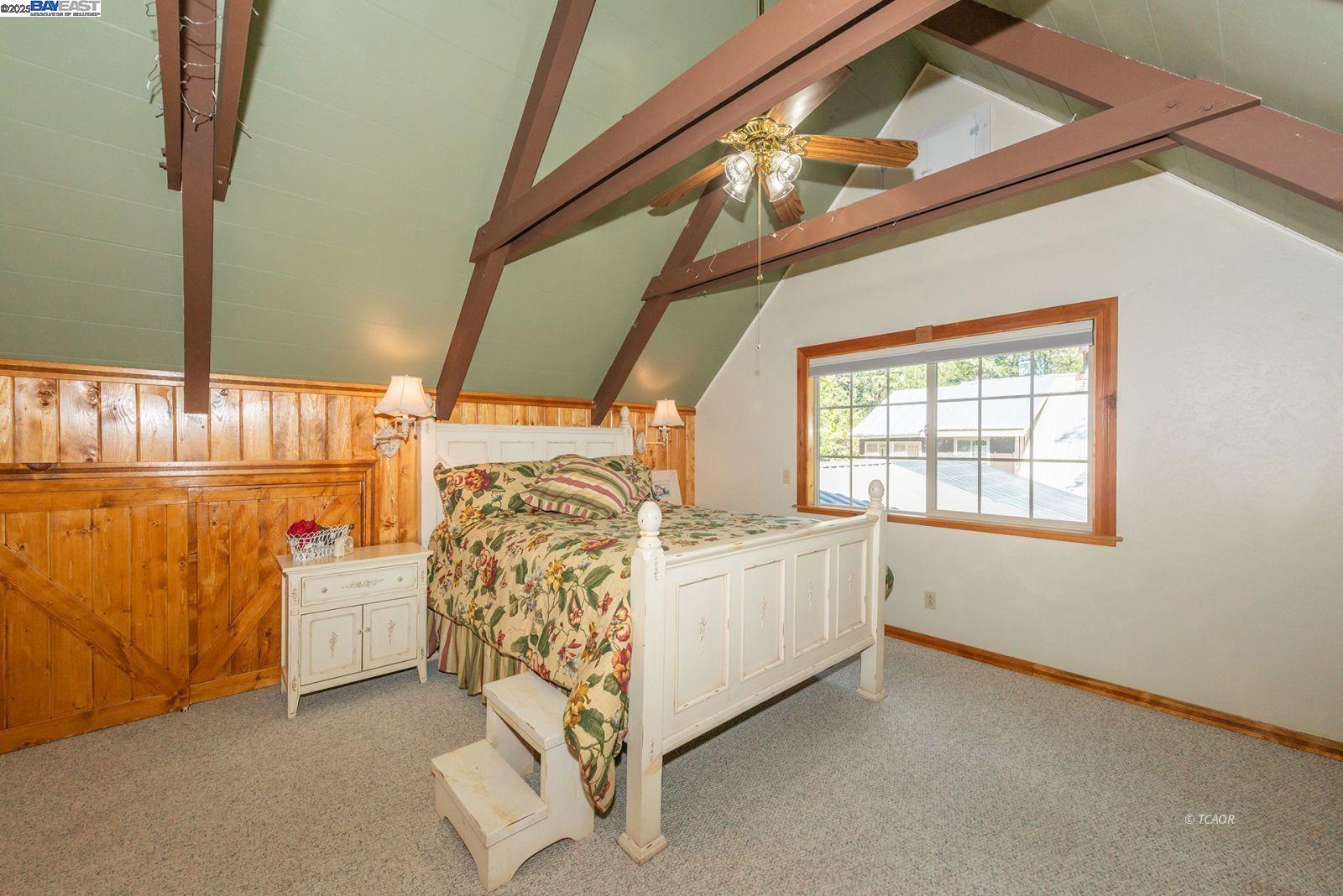 21 Cedar Road Trinity Center, CA 96091 - Photo 13 of 50 a bed room with a bed and a window