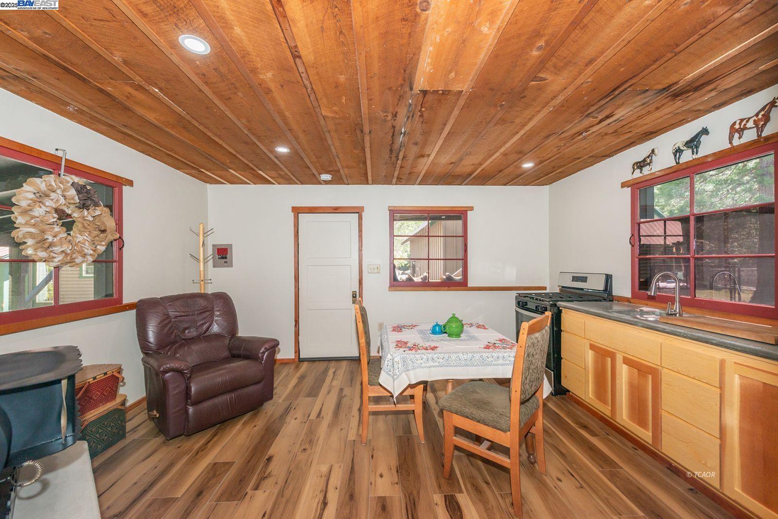 21 Cedar Road Trinity Center, CA 96091 - Photo 18 of 50 a living room with furniture and a wooden floor