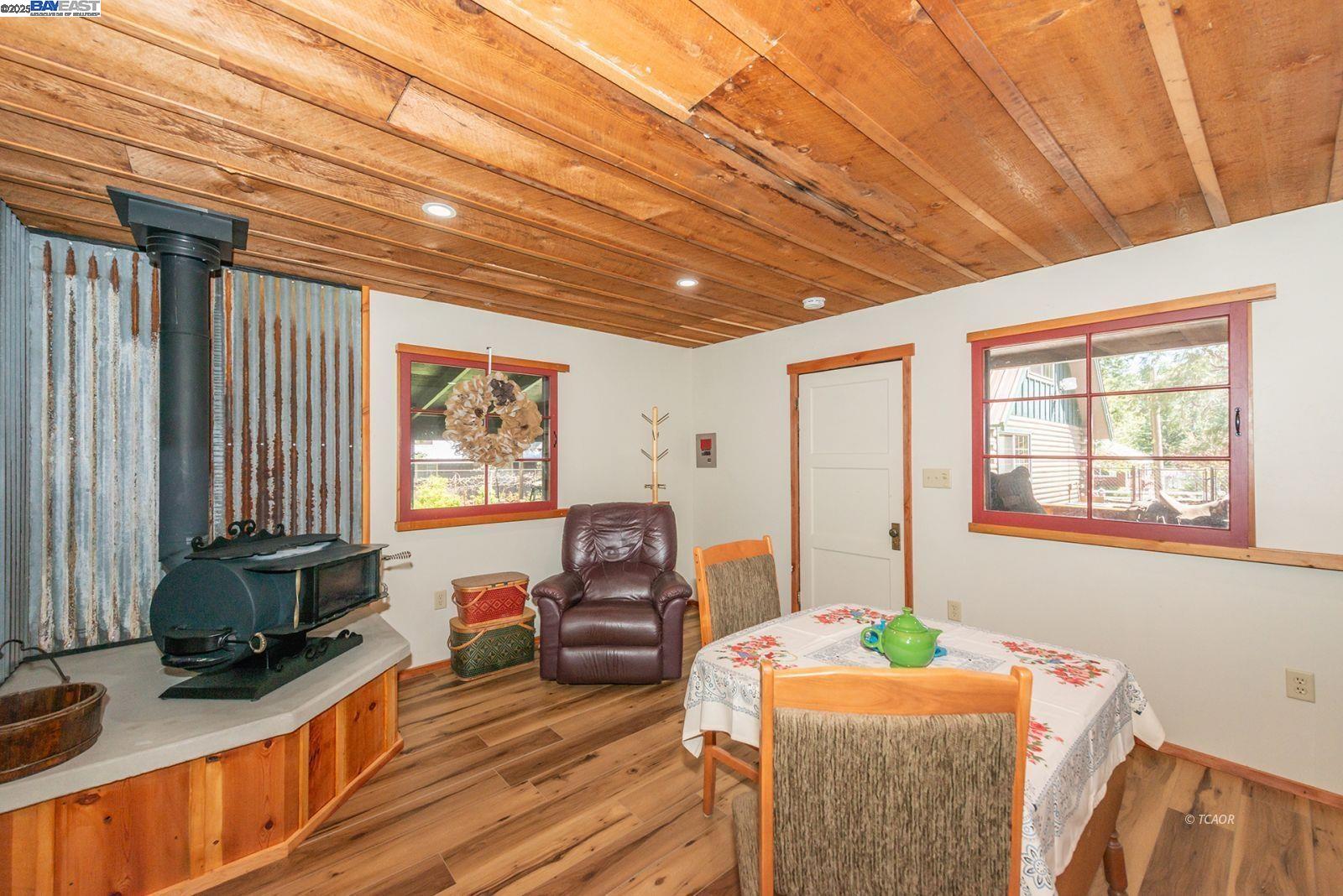 21 Cedar Road Trinity Center, CA 96091 - Photo 19 of 50 a living room with furniture and a flat screen tv