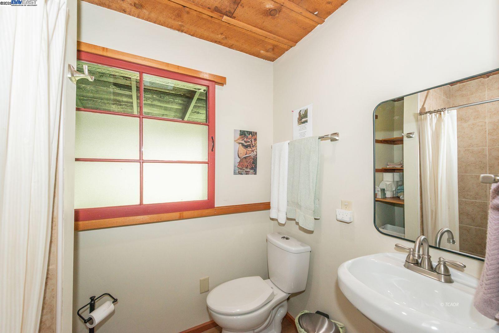 21 Cedar Road Trinity Center, CA 96091 - Photo 22 of 50 a bathroom with a sink a toilet and shower