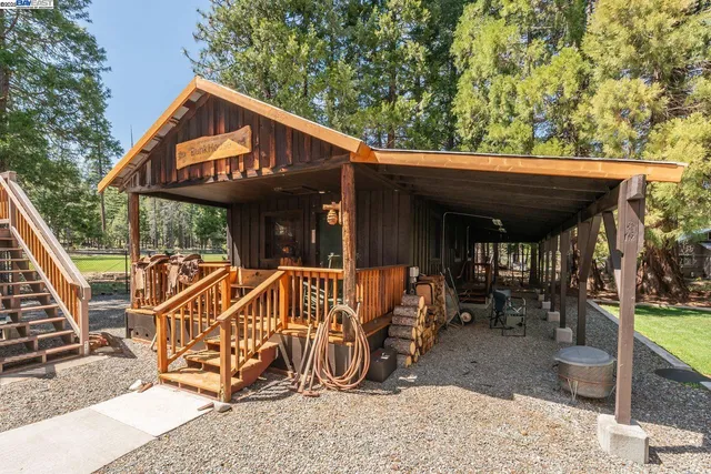 a view of a chairs and table in the patio