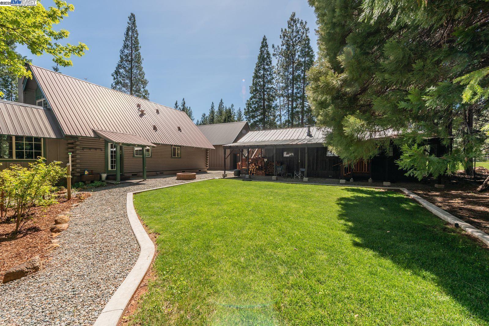 21 Cedar Road Trinity Center, CA 96091 - Photo 40 of 50 a swimming pool with outdoor seating and yard