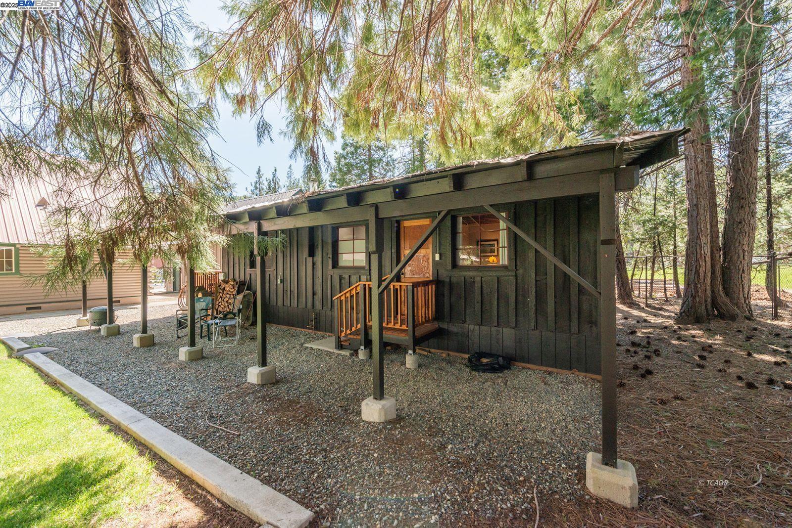21 Cedar Road Trinity Center, CA 96091 - Photo 42 of 50 a view of a house with a yard