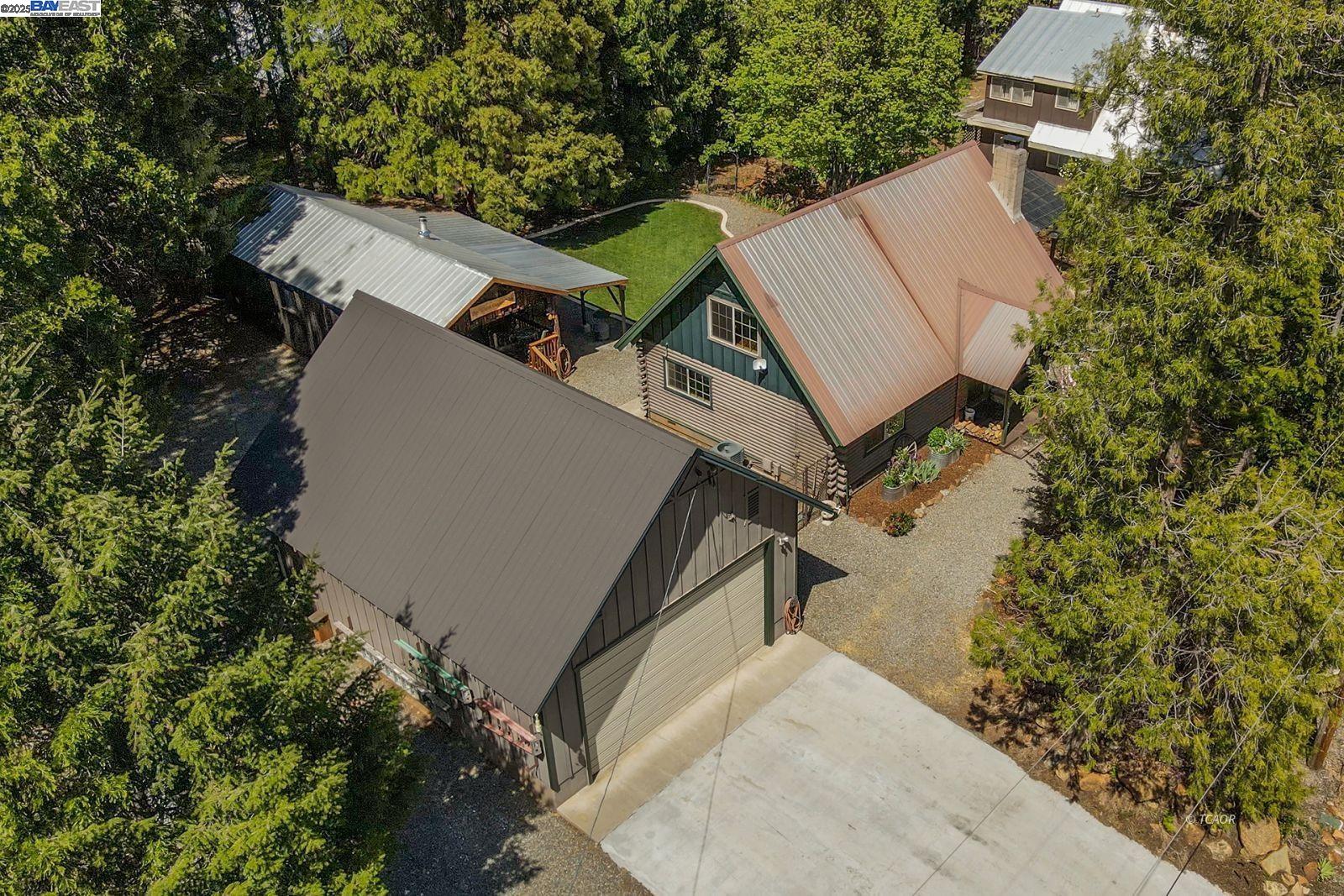 21 Cedar Road Trinity Center, CA 96091 - Photo 47 of 50 an aerial view of a house with a trees