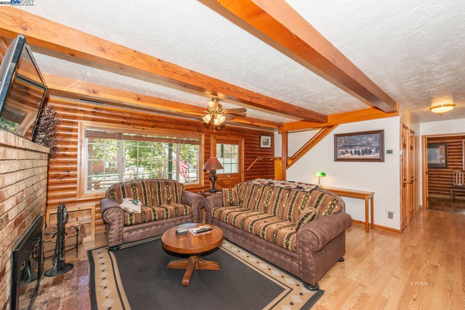 21 Cedar Road Trinity Center, CA 96091 - Photo 5 of 50 a living room with furniture and a large window