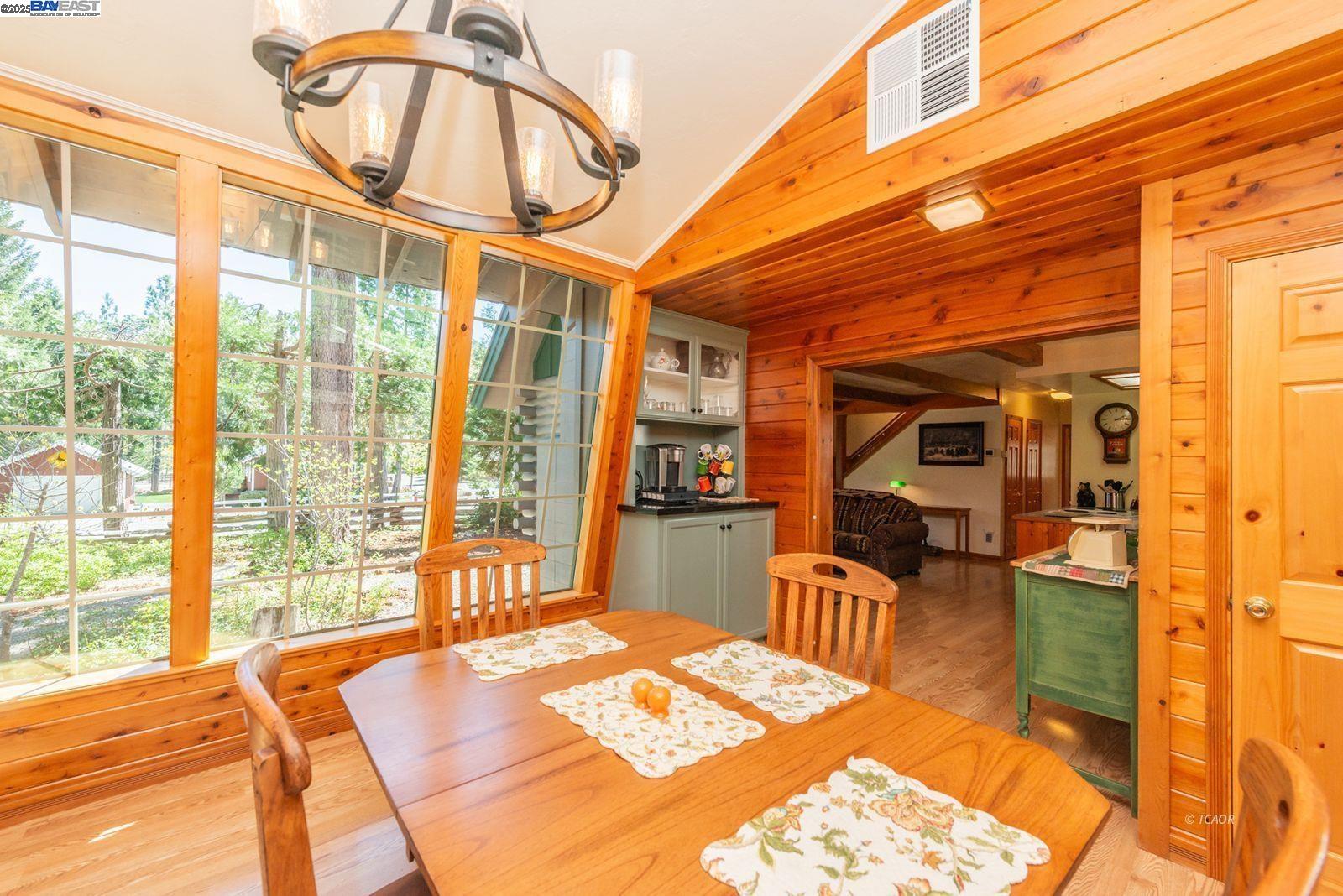 21 Cedar Road Trinity Center, CA 96091 - Photo 9 of 50 a bedroom with furniture and a large window