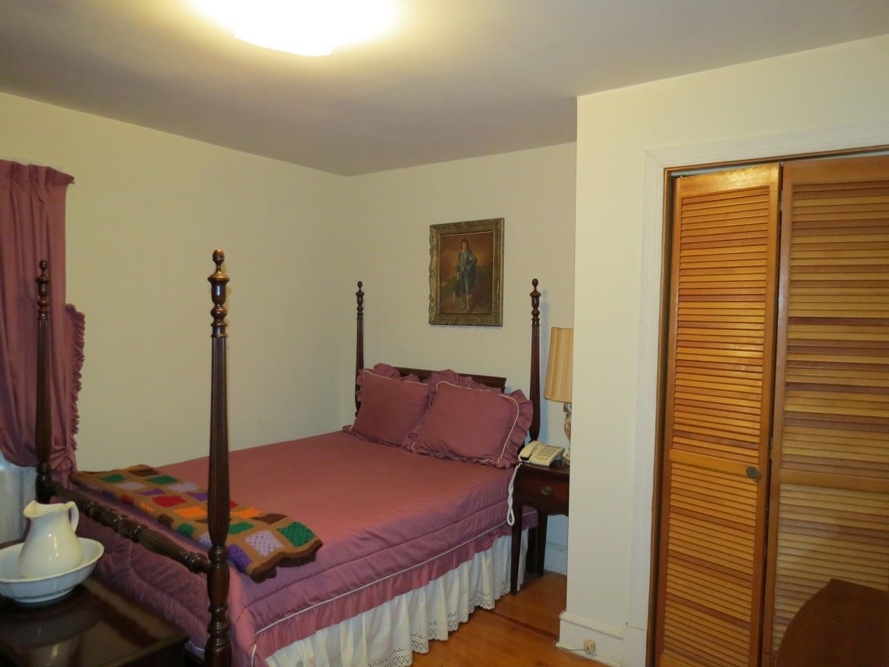 6280 Courthouse Road Louisa, VA 23093 - Photo 23 of 43 a bedroom with a bed and a window