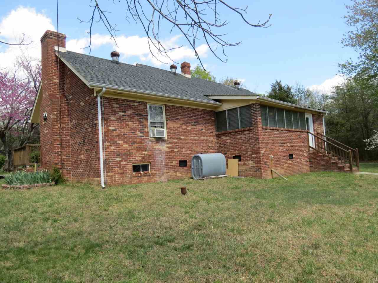6280 Courthouse Road Louisa, VA 23093 - Photo 34 of 43 a view of a house with a backyard