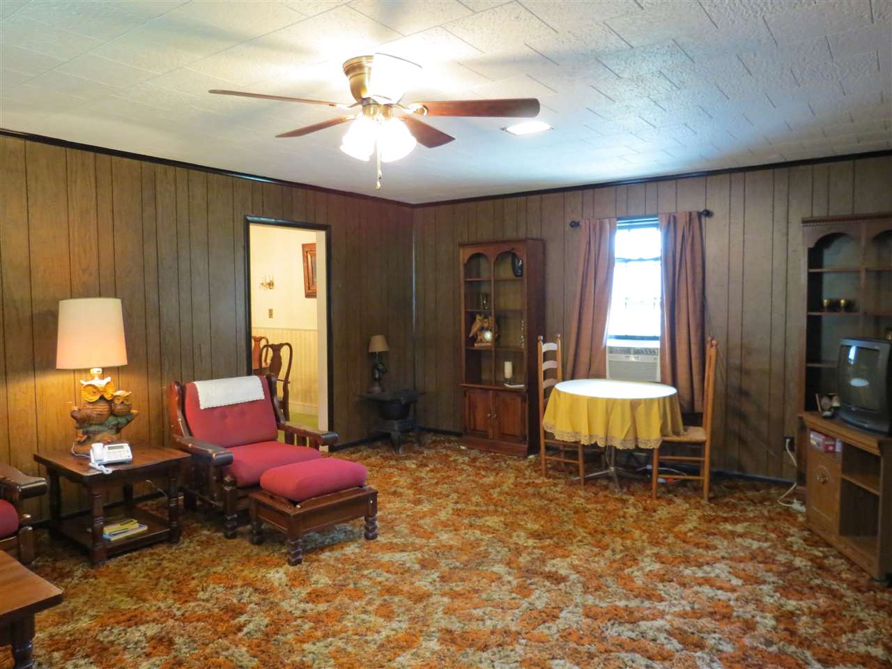 6280 Courthouse Road Louisa, VA 23093 - Photo 7 of 43 a living room with furniture and a chandelier