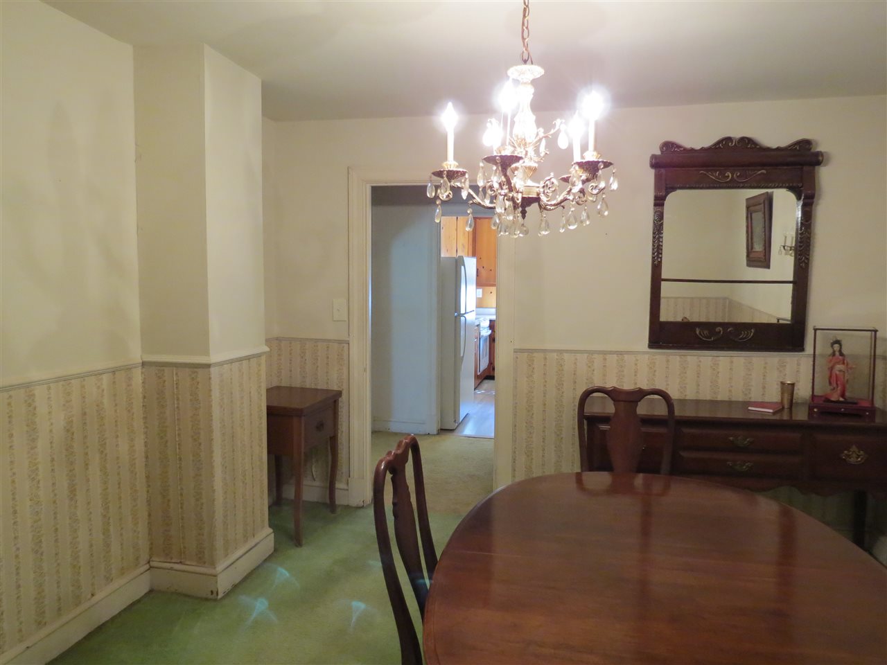 6280 Courthouse Road Louisa, VA 23093 - Photo 9 of 43 a dining room with furniture and chandelier