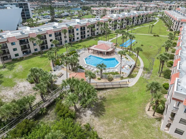 a park view with a bench and trees