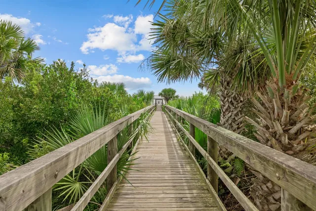 a view of balcony with wooden floor and city view
