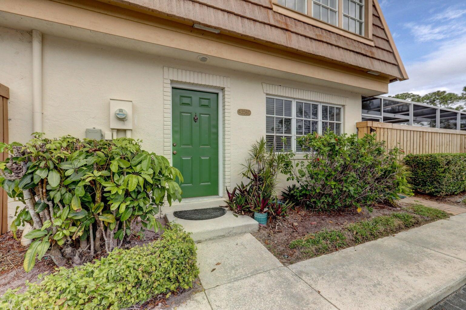 4356 Hazel Avenue, Unit C Palm Beach Gardens, FL 33410 - Photo 2 of 16 front view of a house