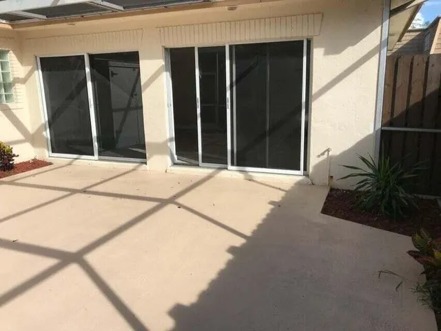 a potted plant sitting in front of a building