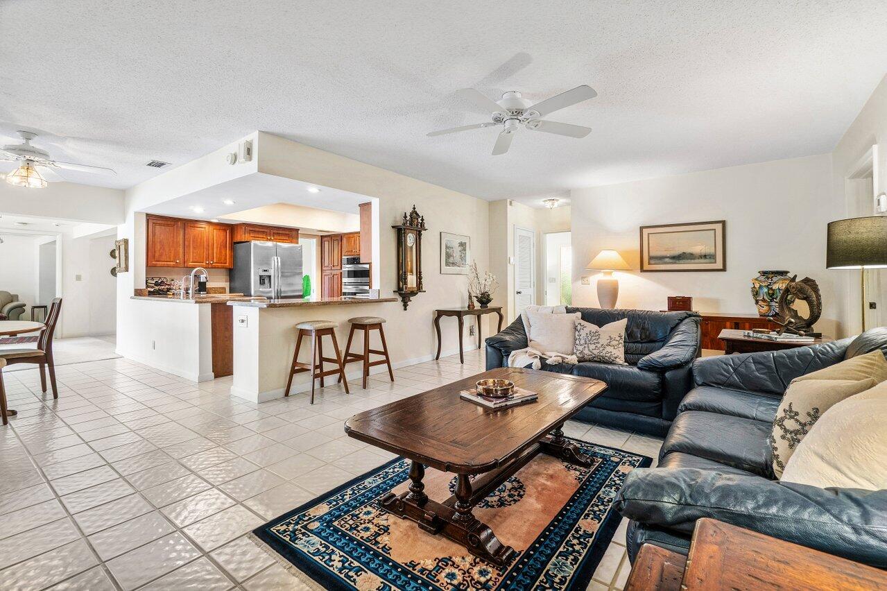 1567 Southwest 6th Terrace Boca Raton, FL 33486 - Photo 9 of 26 Family to kitchen