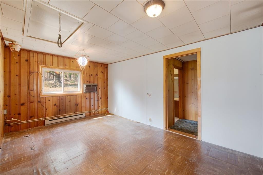 225 Pine Slopes Road Acme, PA 15610 - Photo 18 of 24 a view of an empty room with window