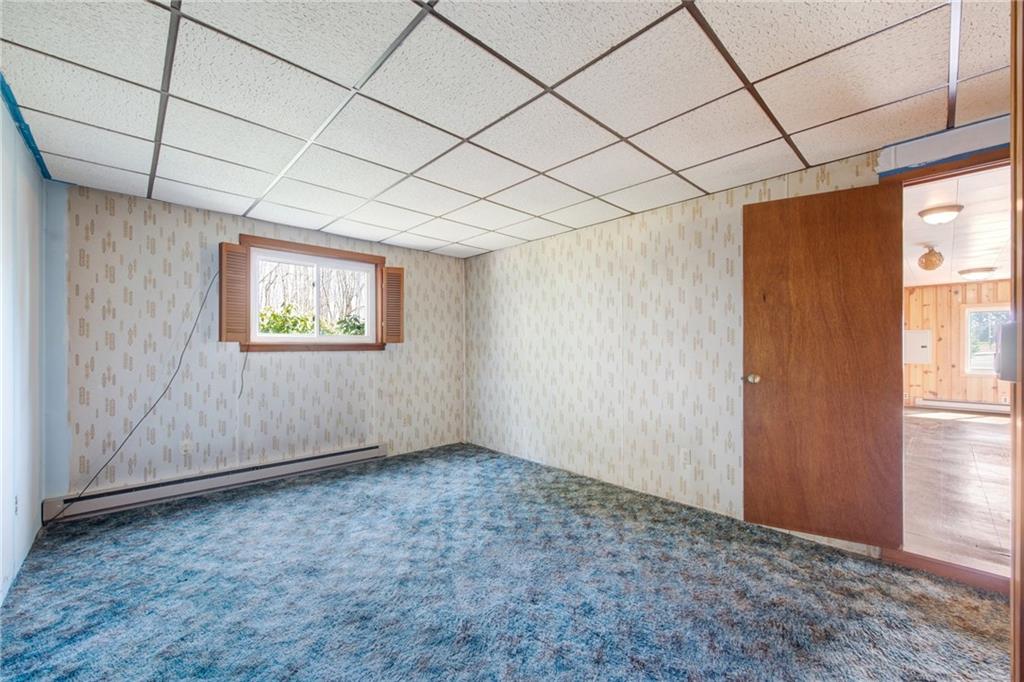 225 Pine Slopes Road Acme, PA 15610 - Photo 19 of 24 a view of an empty room with a window