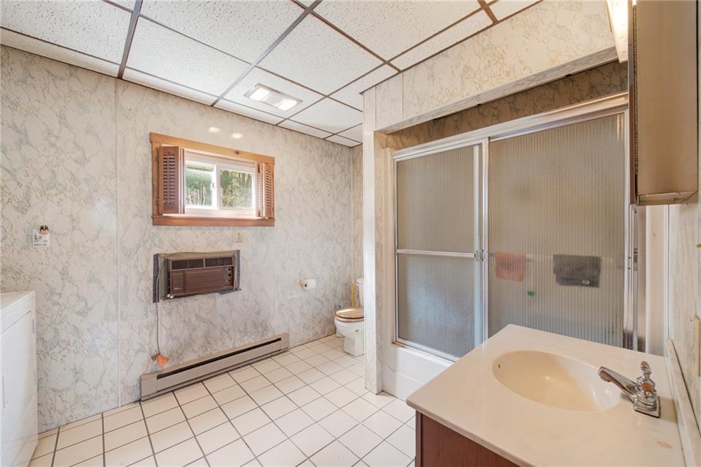 225 Pine Slopes Road Acme, PA 15610 - Photo 24 of 24 a bathroom with a sink and a shower