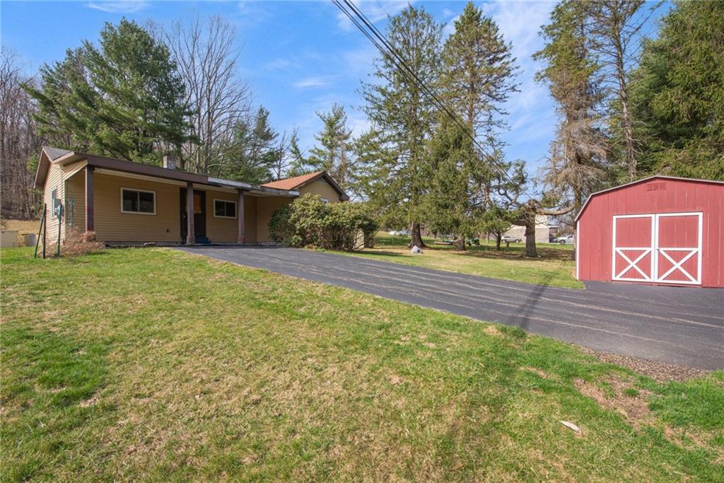 225 Pine Slopes Road Acme, PA 15610 - Photo 5 of 24 a view of a house with a yard