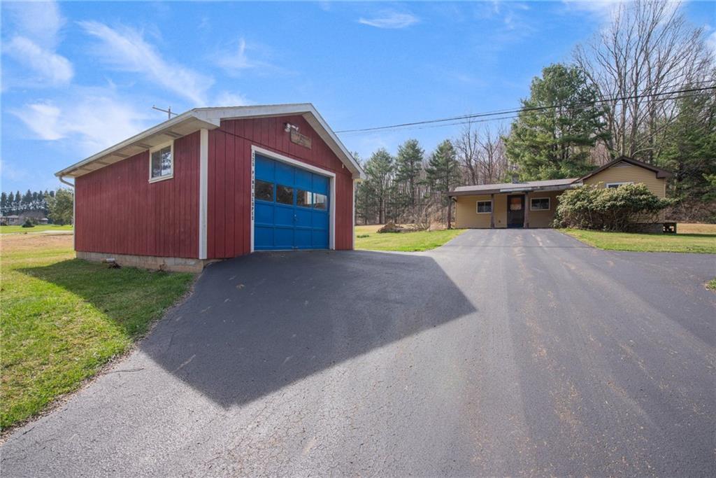 225 Pine Slopes Road Acme, PA 15610 - Photo 6 of 24 a view of a house with a yard