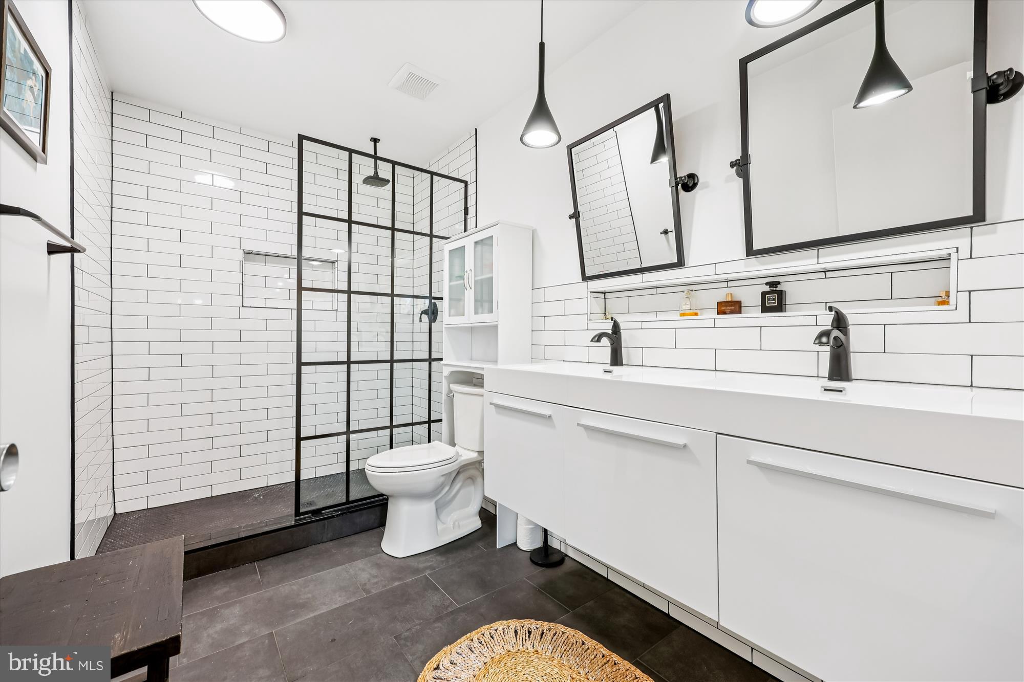 7614 Carteret Road Bethesda, MD 20817 - Photo 15 of 16 Sleek modern bathroom with chic accents.