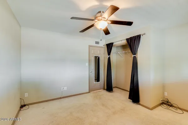 a bathroom with a tub and shower