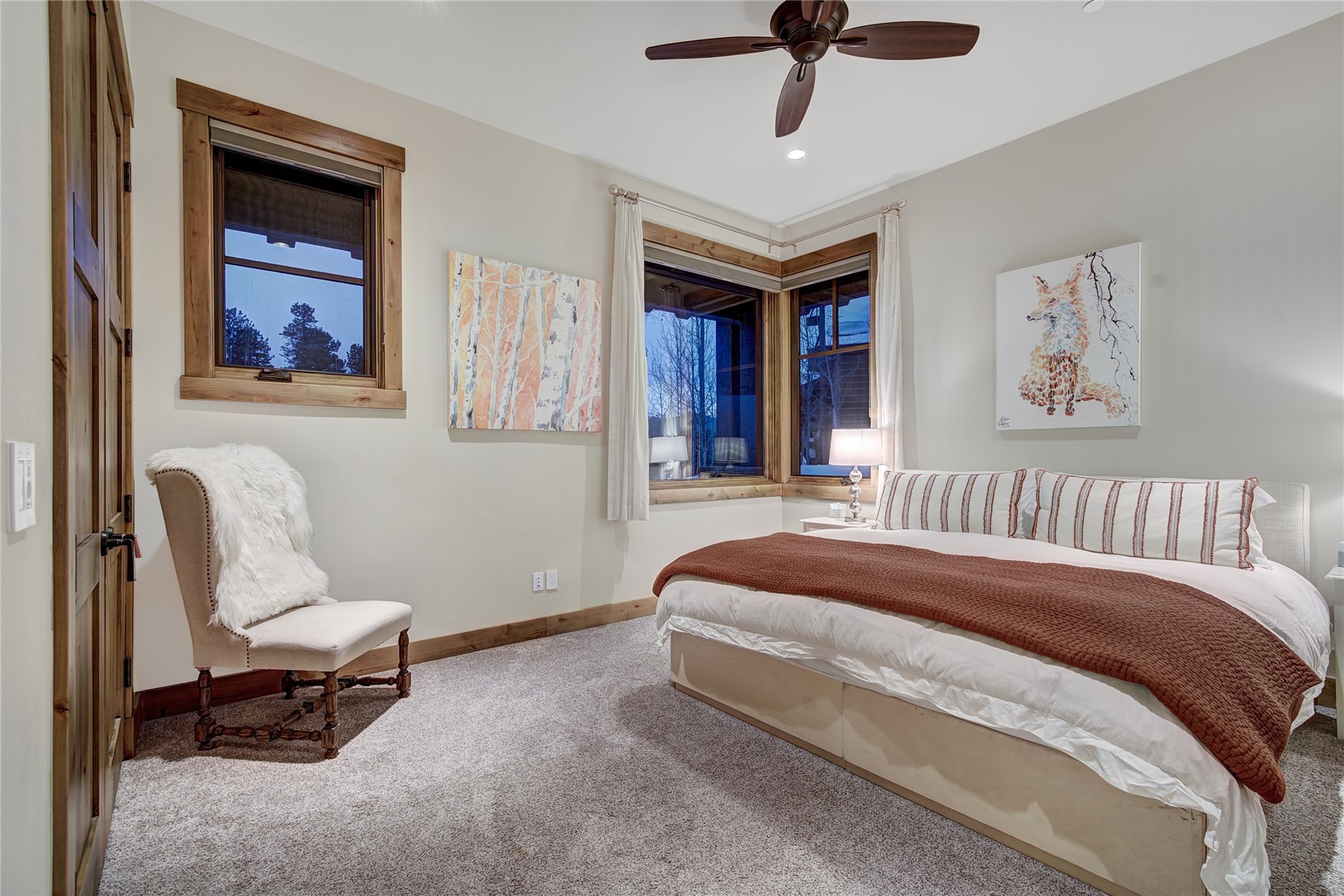 422 Timbertrail Road Breckenridge, CO 80424 - Photo 45 of 50 a bed room with a bed and a chair