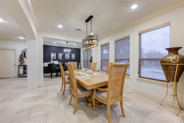 a view of a dining room with furniture