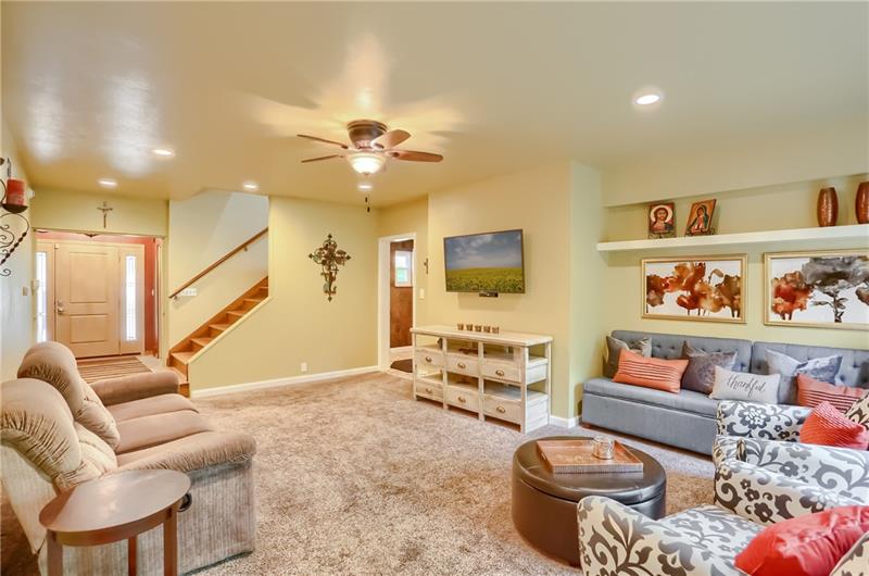 458 Ryndwood Road Pittsburgh, PA 15237 - Photo 11 of 25 Relax in the family room that is a few short steps to the laundry area and attached garage
