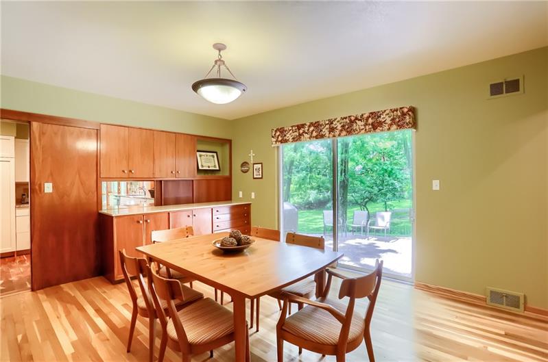 458 Ryndwood Road Pittsburgh, PA 15237 - Photo 9 of 25 The dining room includes built in cabinets and a pass through to the updated kitchen