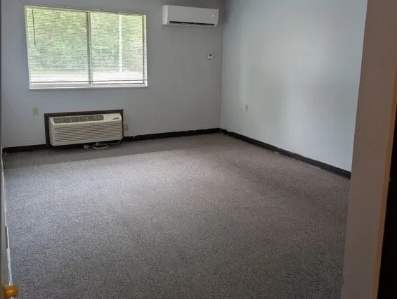 an empty room with windows