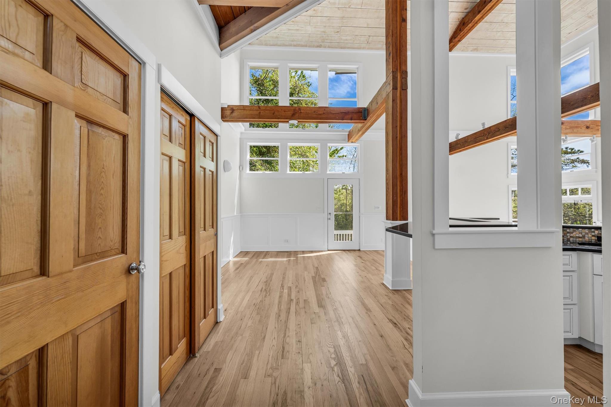 238 Beaver Dam Road Brookhaven, NY 11719 - Photo 10 of 44 view of an entryway with wooden floor and windows