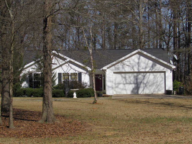 420 Fairview Church Road Forsyth, GA 31029 - Photo 1 of 12 a view of house with yard and entertaining space