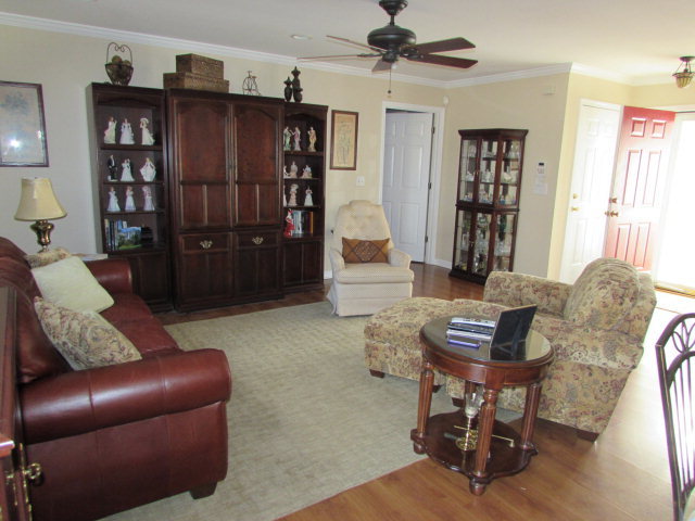 420 Fairview Church Road Forsyth, GA 31029 - Photo 6 of 12 a living room with furniture cabinets and a window