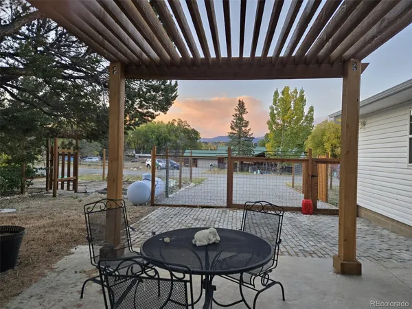 a balcony view with a seating space
