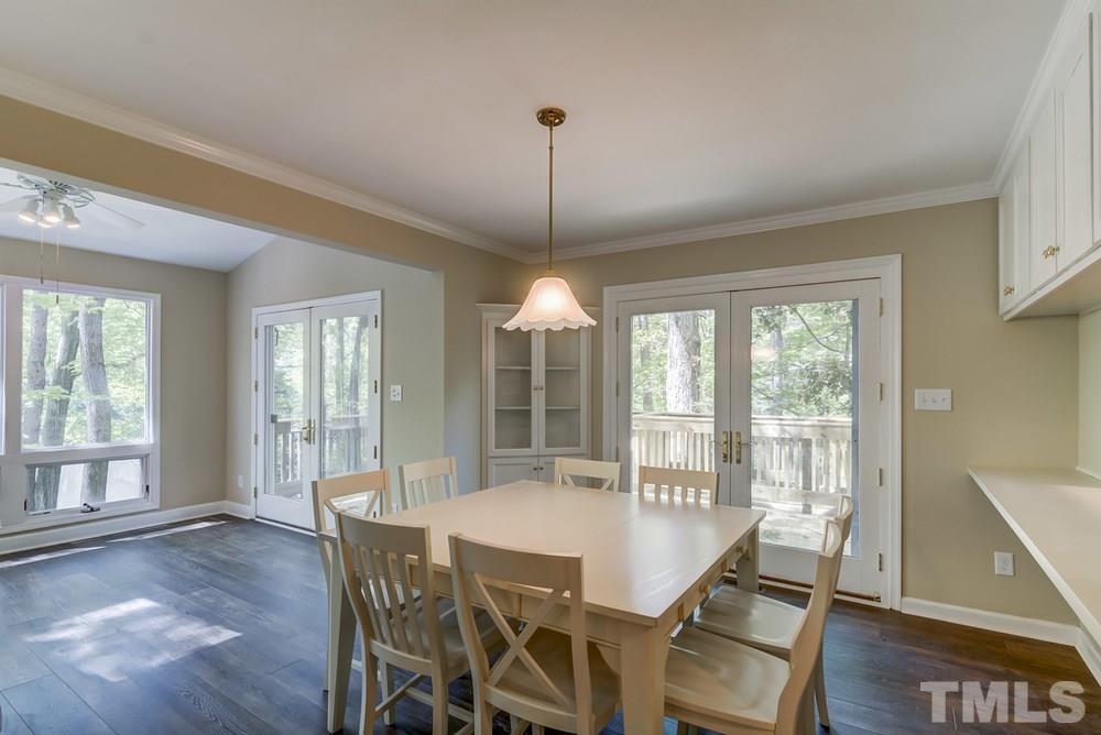 2921 Rue Sans Famille Raleigh, NC 27607 - Photo 6 of 15 a dining room with furniture window wooden floor