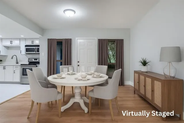 a view of a dining room with furniture