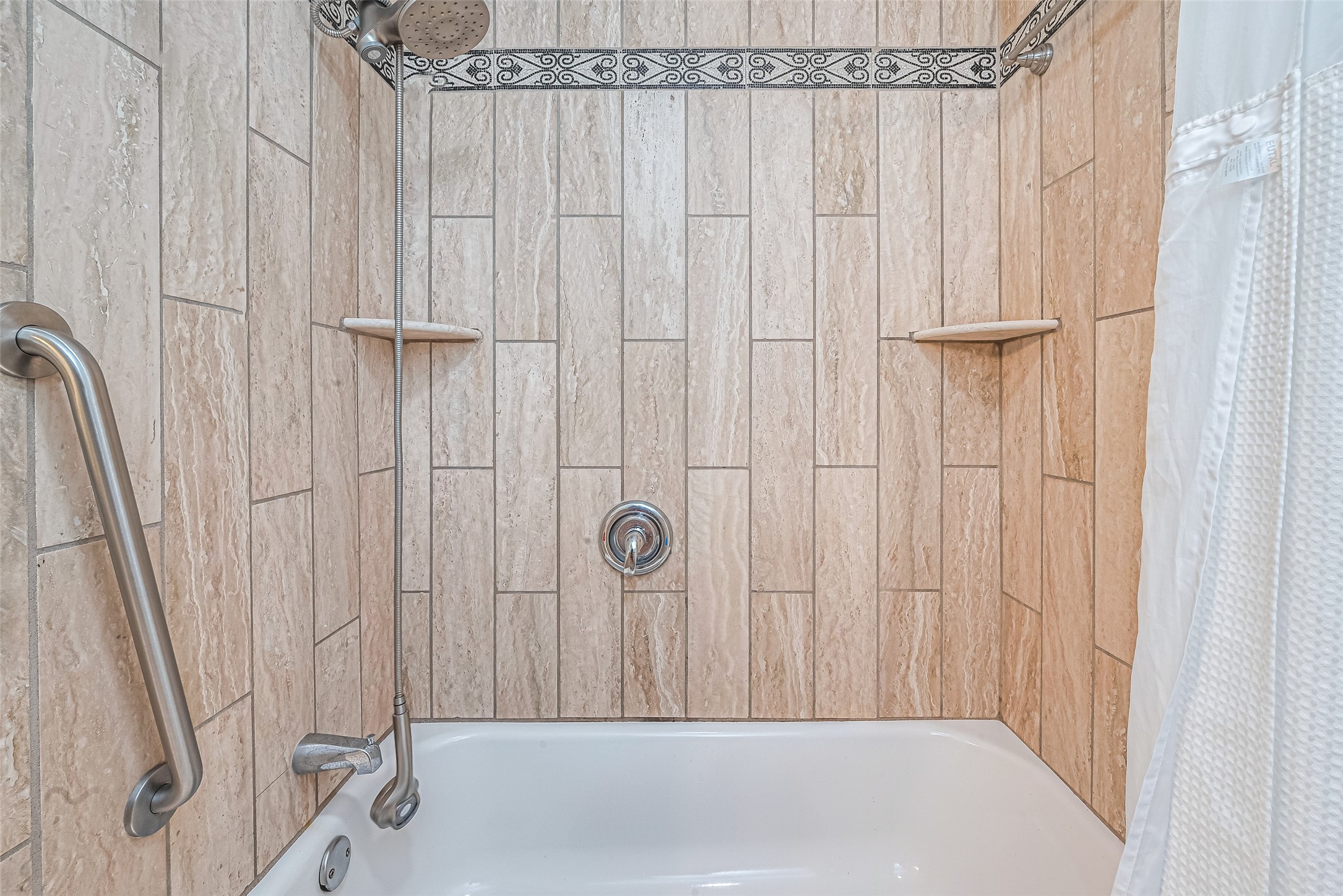 24314 Anderson Street Huffman, TX 77336 - Photo 43 of 48 a bathroom with a shower and a tub