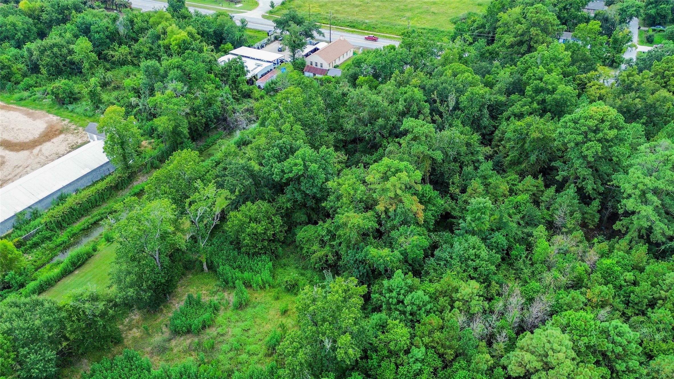 0 Westfield Road Houston, TX 77073 - Photo 2 of 4 an aerial view of residential house with outdoor space and trees all around