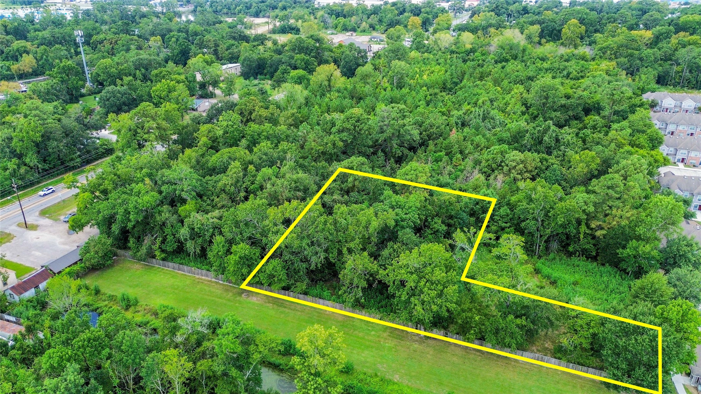 0 Westfield Road Houston, TX 77073 - Photo 4 of 4 a view of a yard with potted plants and more windows