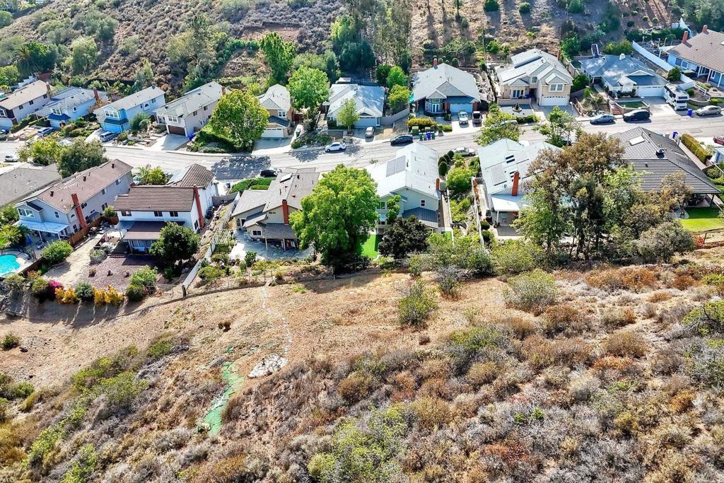 13639 Freeport Road San Diego, CA 92129 - Photo 42 of 44 an aerial view of residential houses with outdoor space