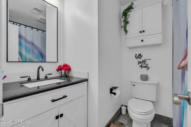 a bathroom with a sink and a toilet